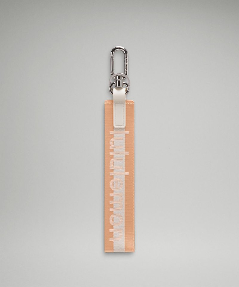 Lululemon Never Lost Keychain *Wordmark Peach Bellini / White Opal / White Online Outlet Sale